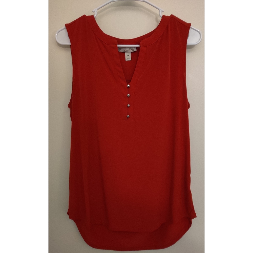 Sleeveless red blouse